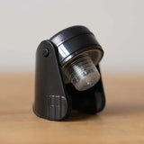 Sip premium Champagne stopper, open to show the seal and hinge