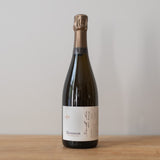 Dosnon Recolte Noire Zero Dosage Champagne bottle on a wooden table